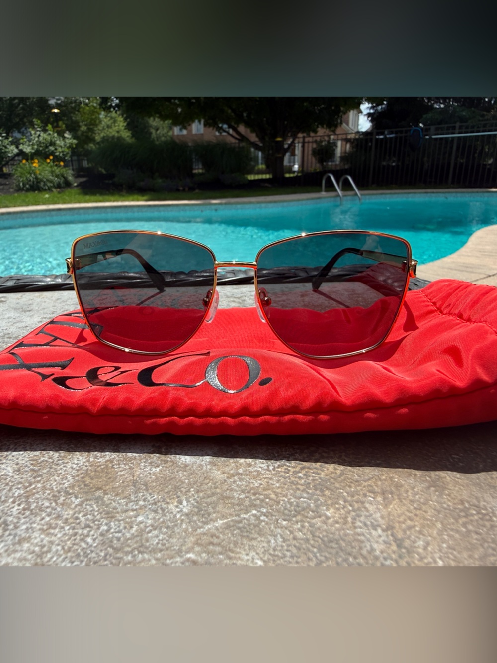 NWOT Max & Co. Gold Frame Sunglasses with Dark Gray Lenses on Red Pouch
